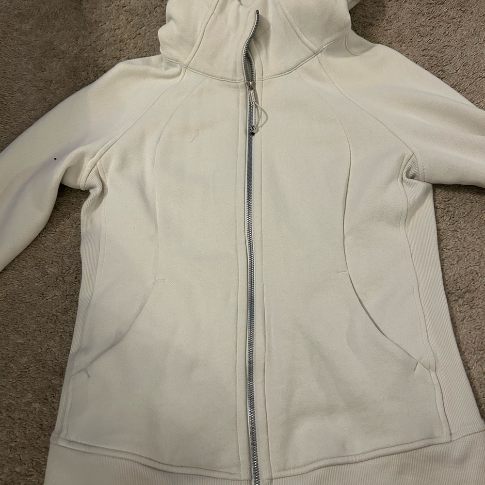 Lululemon full
Zip hoodie.  Size 8.  Bone color.
